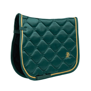 
                  
                    Green saddle pad with gold cord trim, on white background.
                  
                